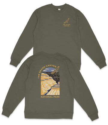 a grey sweatshirt with a graphic design depicting the Grand Canyon and the text "The Grand Canyon National Park" printed on the back.