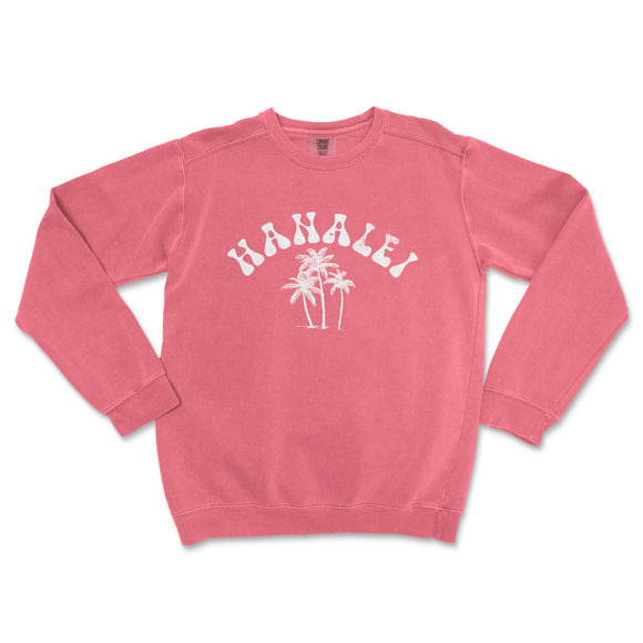 a pink sweatshirt with a palm tree on it