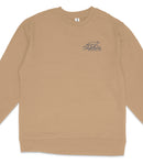 A tan long-sleeved shirt with a blue logo on the left side.