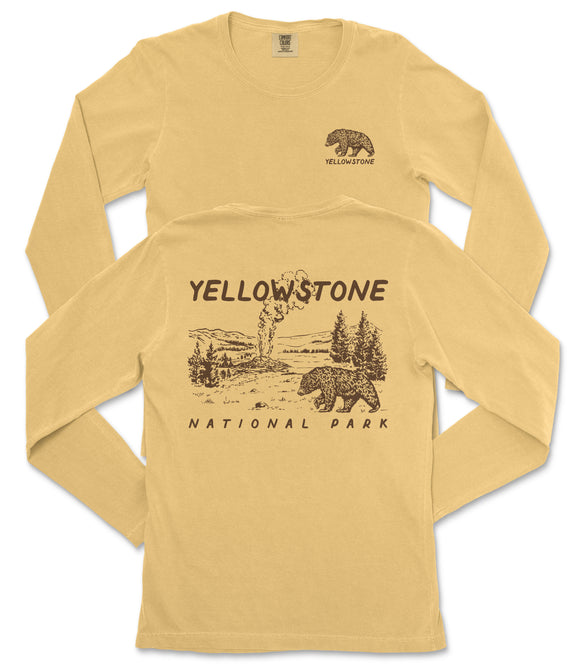 A yellow long-sleeved t-shirt with a graphic design depicting a bear and a landscape, along with the text "Yellowstone National Park" printed on it.