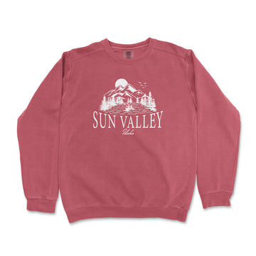 a red sweatshirt with the sun valley logo on it