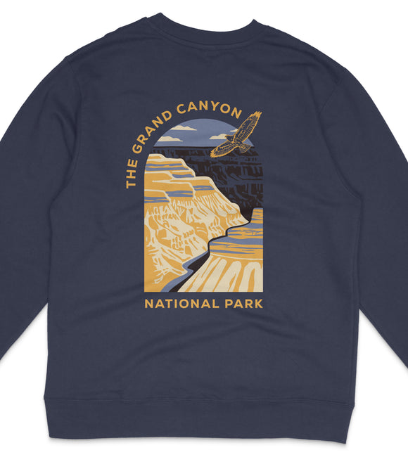 a graphic design of a canyon with a bird flying over it, representing the Grand Canyon National Park.