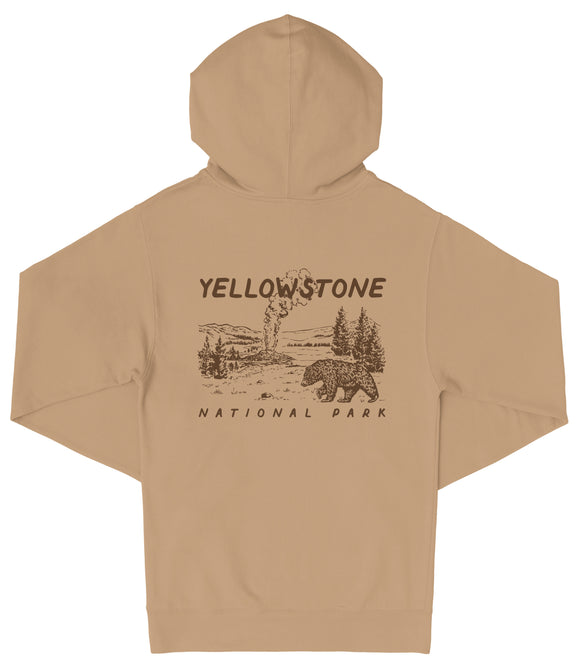 A beige hooded sweatshirt with a graphic design depicting a landscape with a bear and trees, along with the text "Yellowstone National Park" printed on the back.