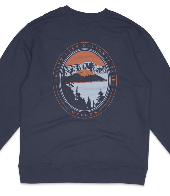 A navy blue sweatshirt with a graphic design featuring a mountain landscape and a lake.