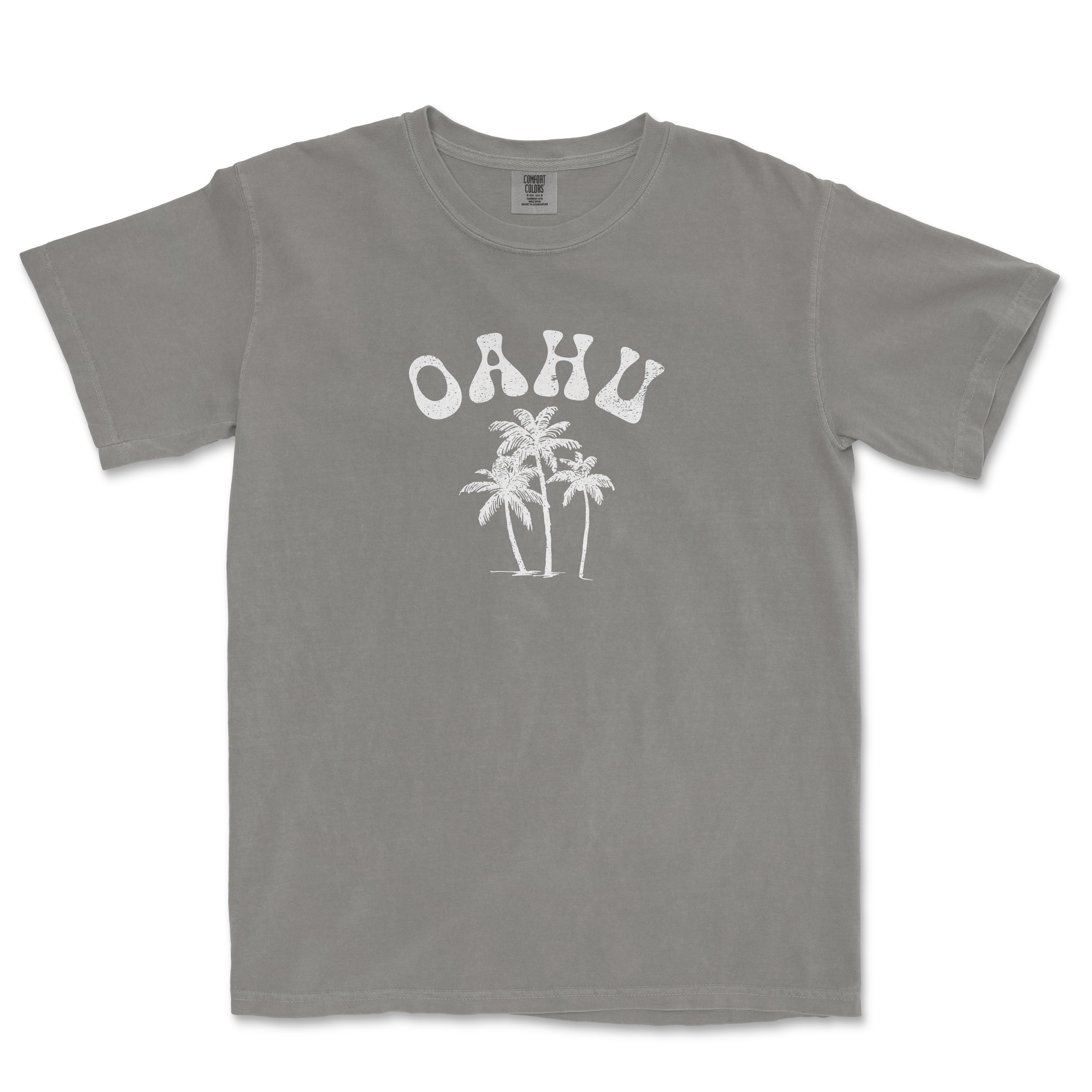 a t - shirt with a palm tree and the word ohu on it