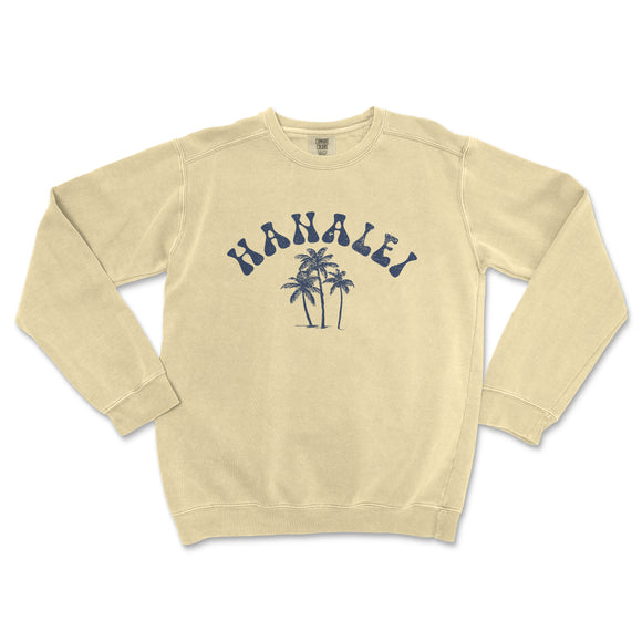 a cream sweatshirt with a palm tree on it