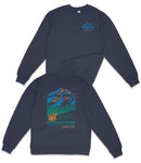 a dark blue long-sleeved shirt with a graphic design on the back, depicting a mountain landscape with a bear.