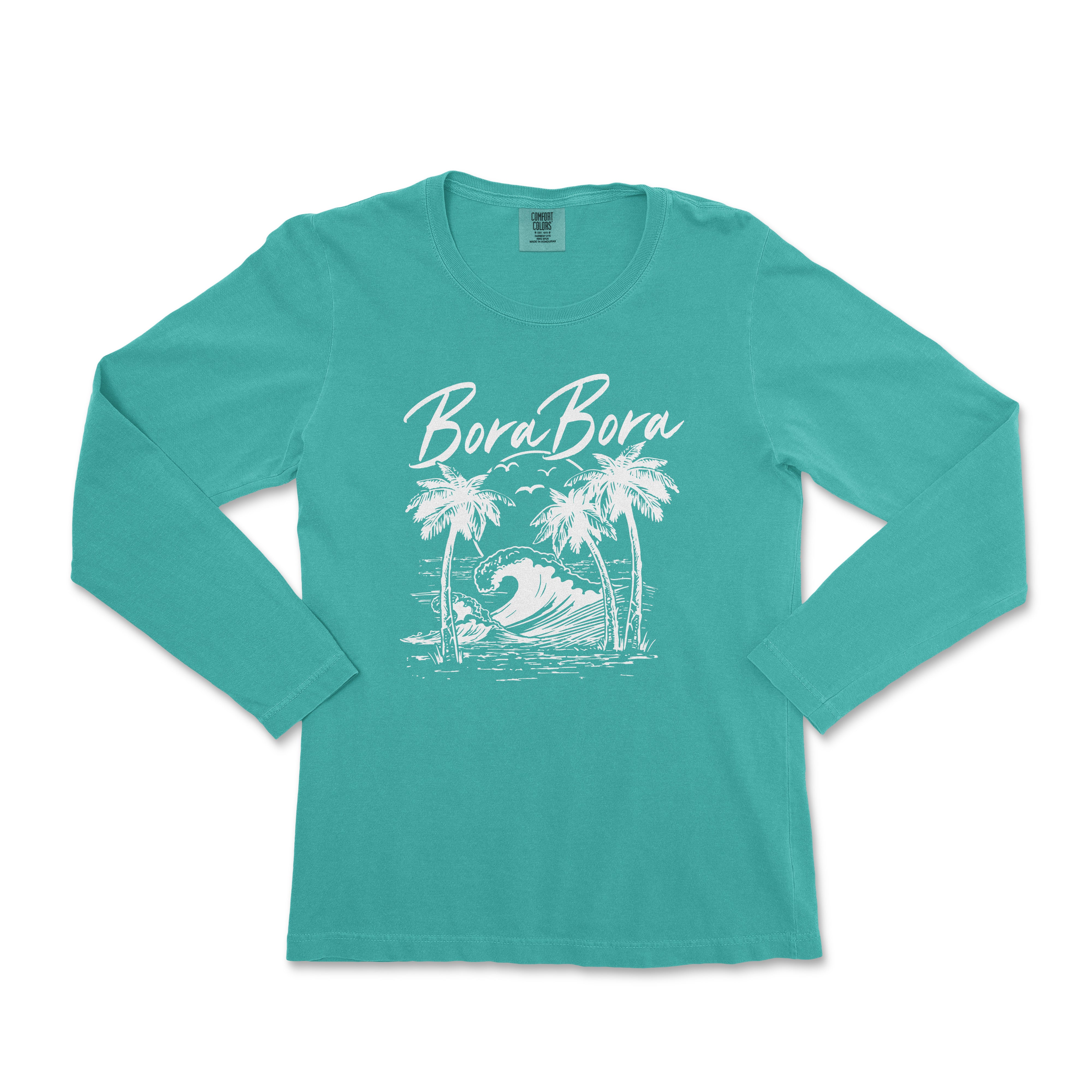 a women's long - sleeved shirt with a surfboard and palm trees