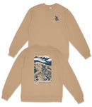 two tan sweatshirts with a graphic design on the back. The design features a blue and white illustration of a person riding a bicycle, along with the text "Siena Park" printed below the image.