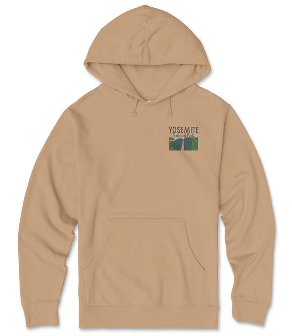 A beige hooded sweatshirt with a graphic design on the front, featuring a mountain landscape and the text "YOSEMITE" printed on it.