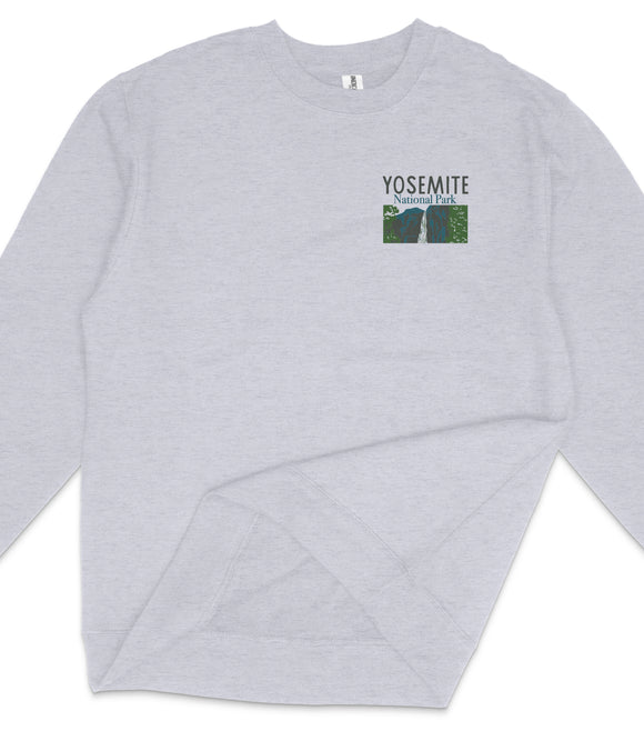 A gray sweatshirt with a logo on the front, featuring a graphic of a mountain and the text "YOSEMITE NATIONAL PARK".