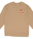 A beige long-sleeved shirt with a red graphic and text on the left side.