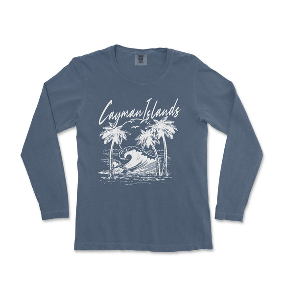 a women's long sleeve shirt with a graphic of a wave and palm trees