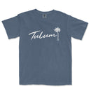 a blue t - shirt with the word tulum written in white