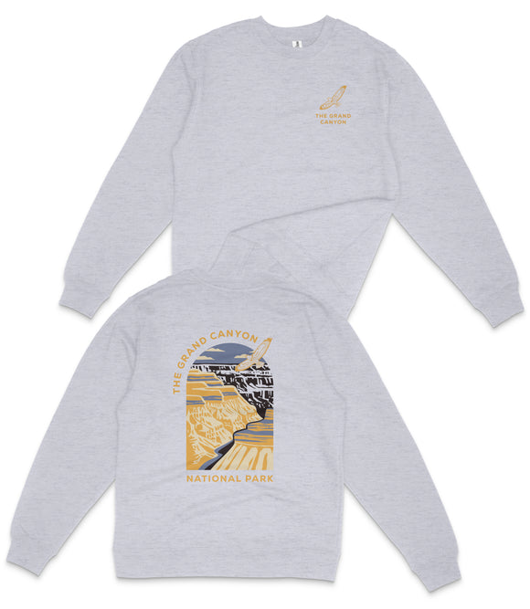 A grey sweatshirt with a graphic design depicting a canyon and the text "The Grand Canyon National Park" printed on the back.