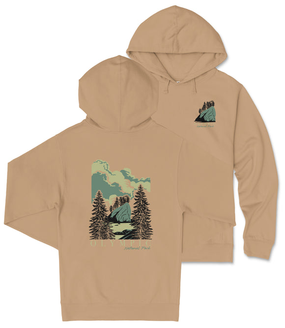 A beige hoodie with a graphic design depicting a forest scene with pine trees and a mountain landscape.