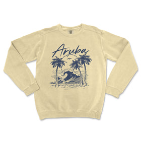 a cream sweatshirt with an image of an ocean wave and palm trees