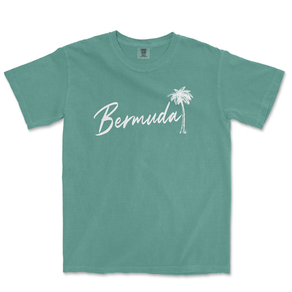 a green t - shirt with the word bermuda written in white