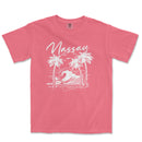 a pink shirt with a picture of a wave and palm trees
