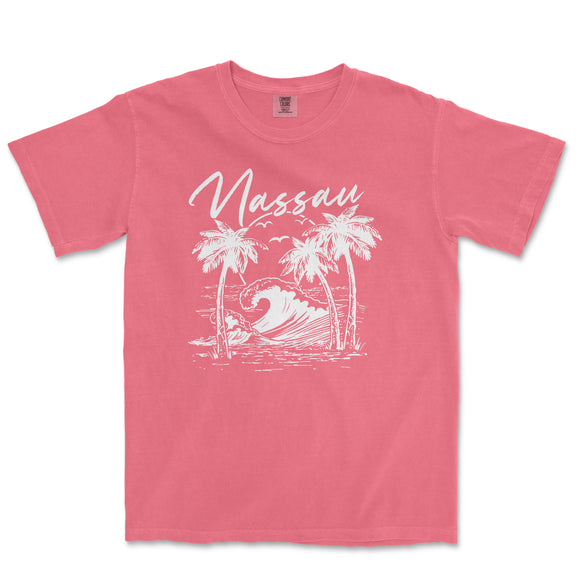 a pink shirt with a picture of a wave and palm trees