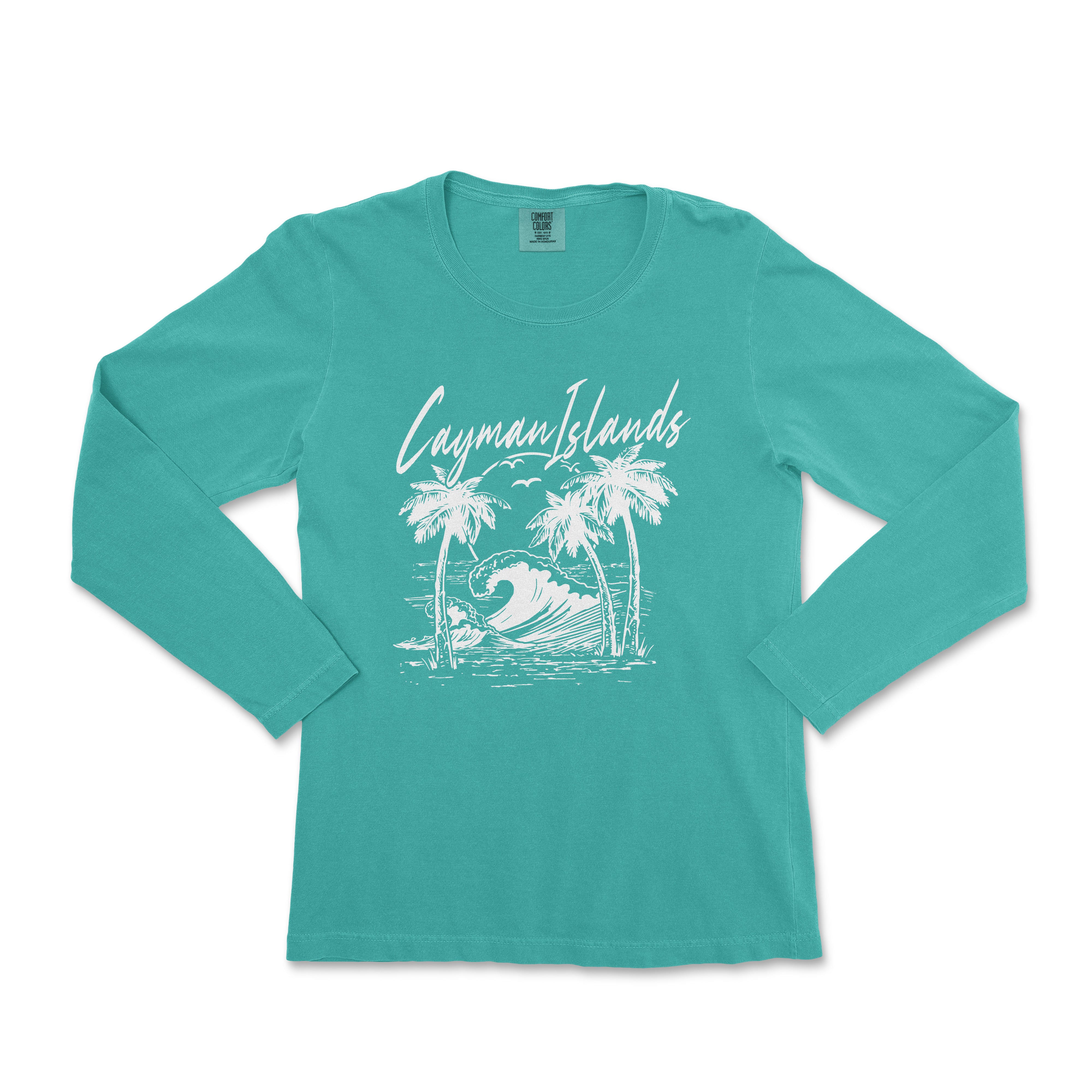 a women's long sleeve shirt with a graphic of a wave and palm trees