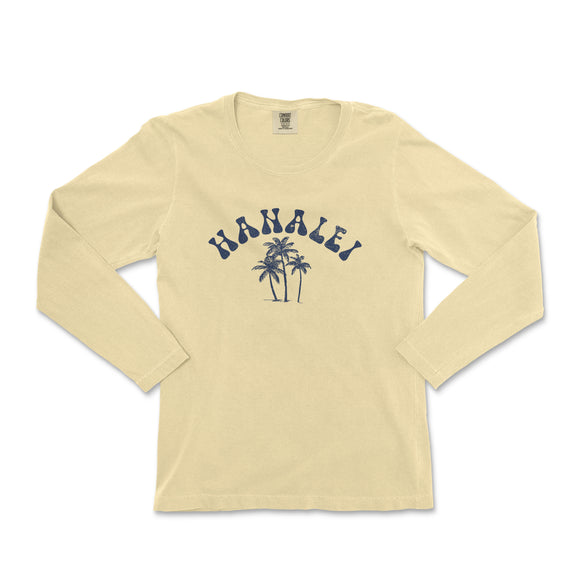 a yellow long sleeve shirt with a palm tree on it