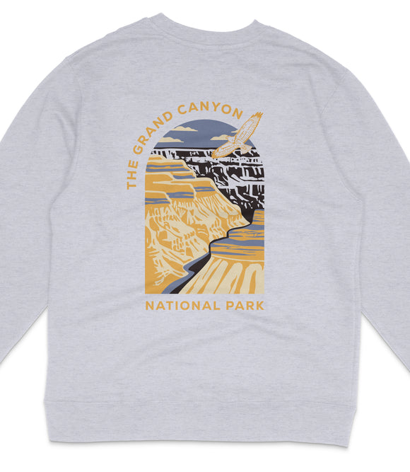 A gray sweatshirt with a graphic design depicting the Grand Canyon and the text "The Grand Canyon National Park" printed on it.