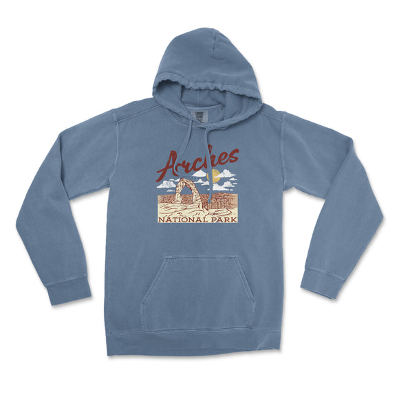 a blue hoodie with an image of a horse in the background