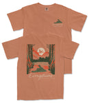 a t-shirt with a graphic design depicting a serene landscape with a lake, trees, and a bird in flight. The text on the t-shirt reads "Everyglades National Park".