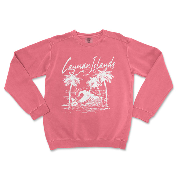 a pink sweatshirt with a picture of a surfer on it
