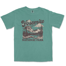a green t - shirt with a picture of yosemite national park