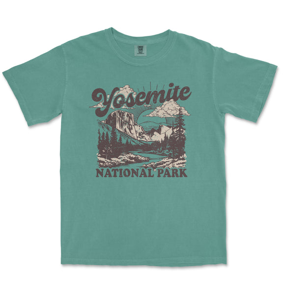 a green t - shirt with a picture of yosemite national park