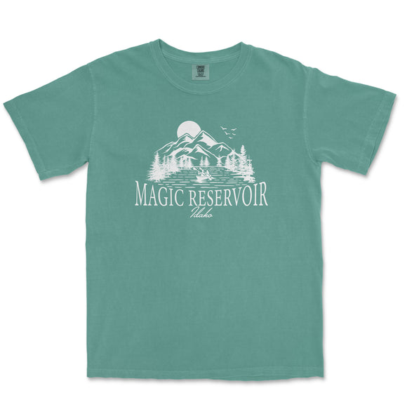 a green t - shirt with the words magic reservoir on it