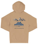 A tan hooded sweatshirt with a graphic design depicting a cabin and mountains in the background, along with the text "Grand Teton National Park".