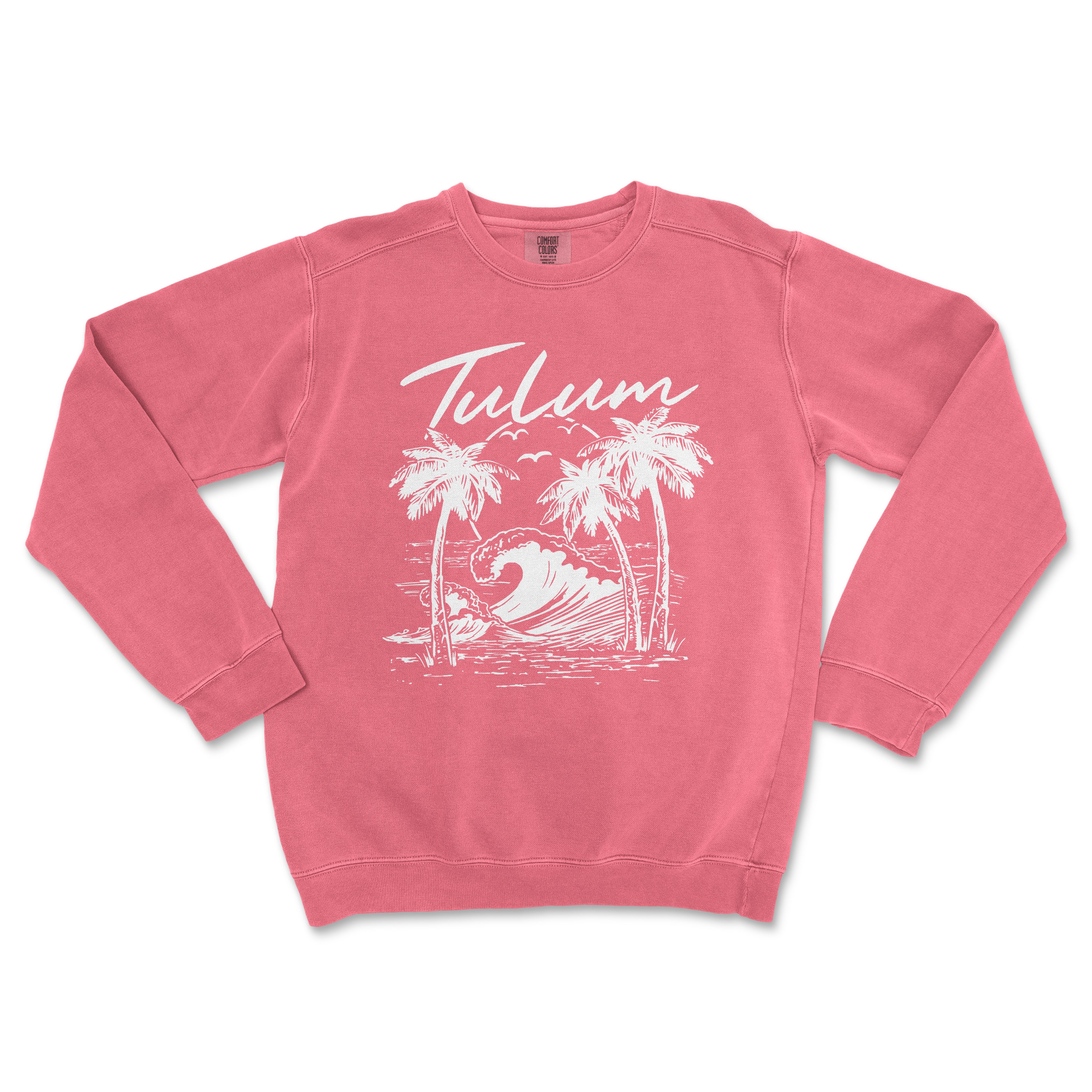 a pink sweatshirt with a palm tree and a surfboard on it