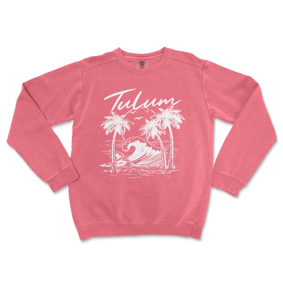 a pink sweatshirt with a palm tree and a surfboard on it