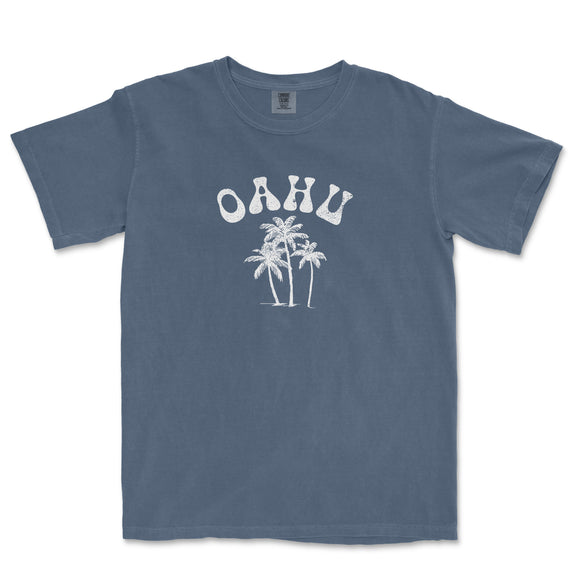 a blue t - shirt with a palm tree and the word ohu on it
