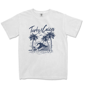 a white t - shirt with a picture of a wave and palm trees