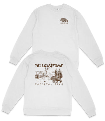 A white long-sleeved shirt with a graphic design depicting a bear and a scenic landscape, along with the text "Yellowstone National Park" printed on the back.