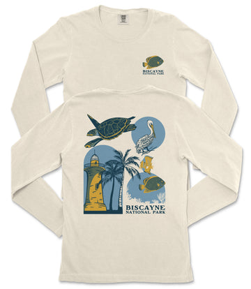 a white long-sleeved t-shirt with a graphic design depicting various marine life and landmarks, including a lighthouse, a turtle, a bird, and a palm tree.
