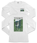 A white long-sleeved t-shirt with a graphic design depicting a waterfall and mountains, along with the text "Yosemite National Park" printed on it.