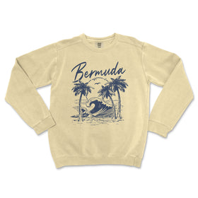 a sweatshirt with a picture of a surfboarder riding a wave