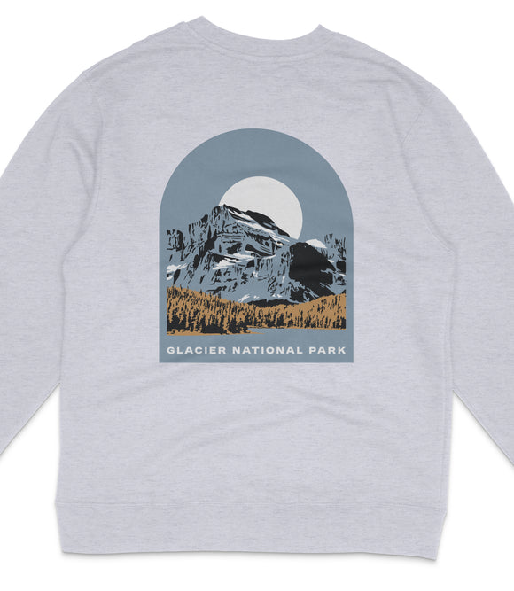 A gray sweatshirt with a graphic design depicting a mountain landscape with a large moon in the sky.