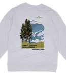 A gray sweatshirt with a graphic design depicting a forest scene with pine trees and mountains in the background, along with the text "GREAT SMOKY MOUNTAINS NATIONAL PARK".