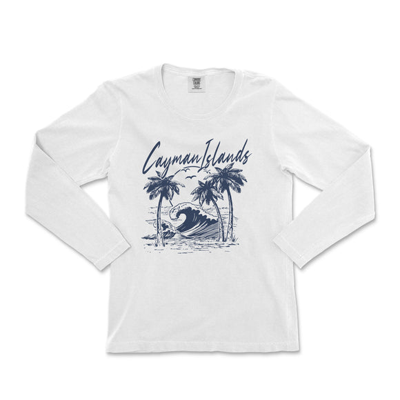 a white long - sleeved shirt with a picture of a wave and palm trees