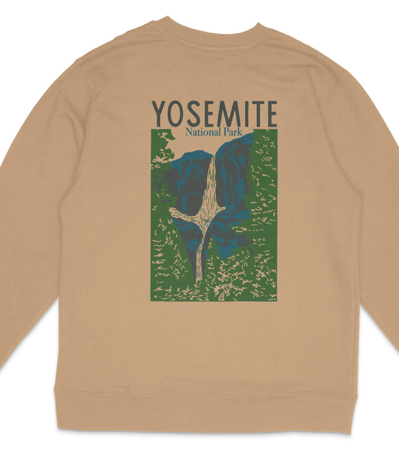 A beige sweatshirt with a graphic design depicting a waterfall and mountains, along with the text "YOSEMITE National Park".