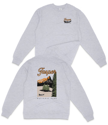 A grey sweatshirt with a graphic design depicting a scenic landscape with mountains, trees, and a river.
