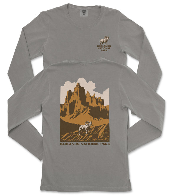 a gray long-sleeved t-shirt with a graphic design depicting a mountain landscape and a bighorn sheep.
