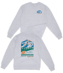 A gray sweatshirt with a graphic design depicting a mountain landscape and a bear.