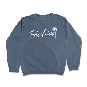 a blue sweatshirt with a palm tree on it